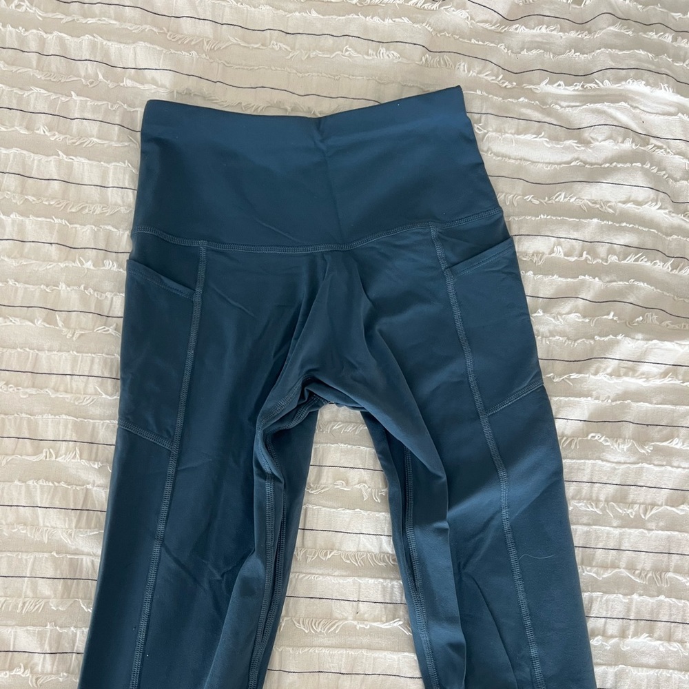 Melissa Merk 3 piece set, legging, biker short and sports bra.